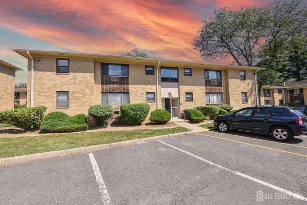 a car parked in front of a house