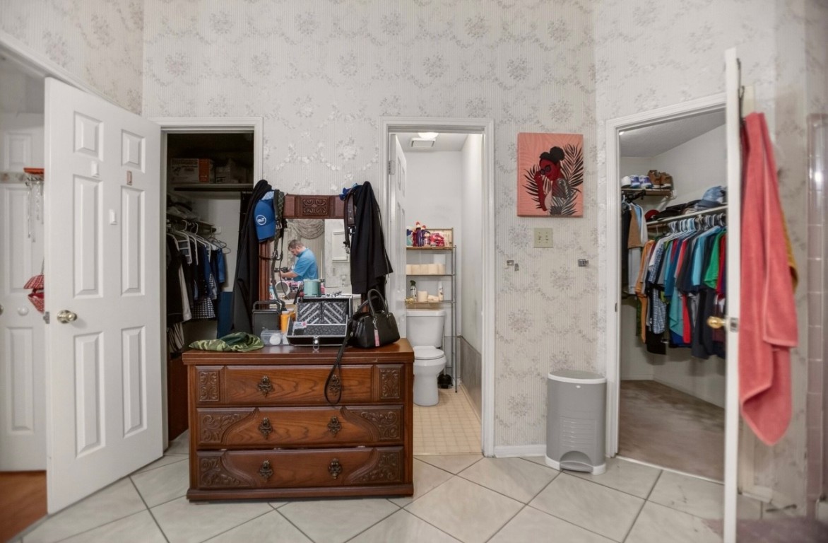 14731 Ridgechase Lane Houston, TX 77014 - Photo 14 of 29 a view of walk in closet