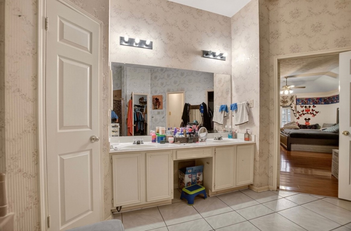14731 Ridgechase Lane Houston, TX 77014 - Photo 15 of 29 a view of kitchen with sink and refrigerator