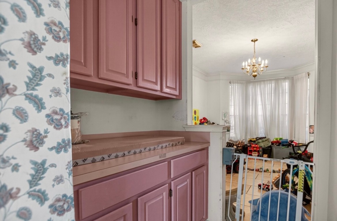 14731 Ridgechase Lane Houston, TX 77014 - Photo 19 of 29 a view of a kitchen with a stove