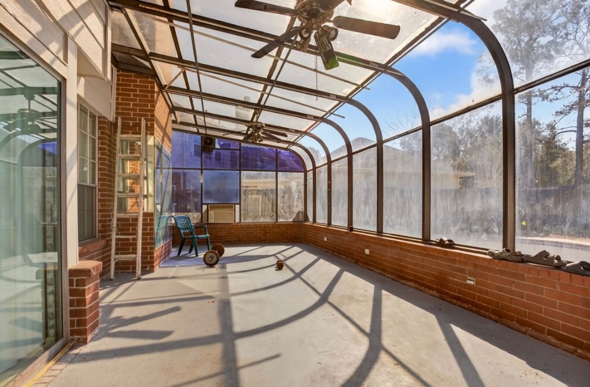 14731 Ridgechase Lane Houston, TX 77014 - Photo 20 of 29 a building outdoor space with patio furniture