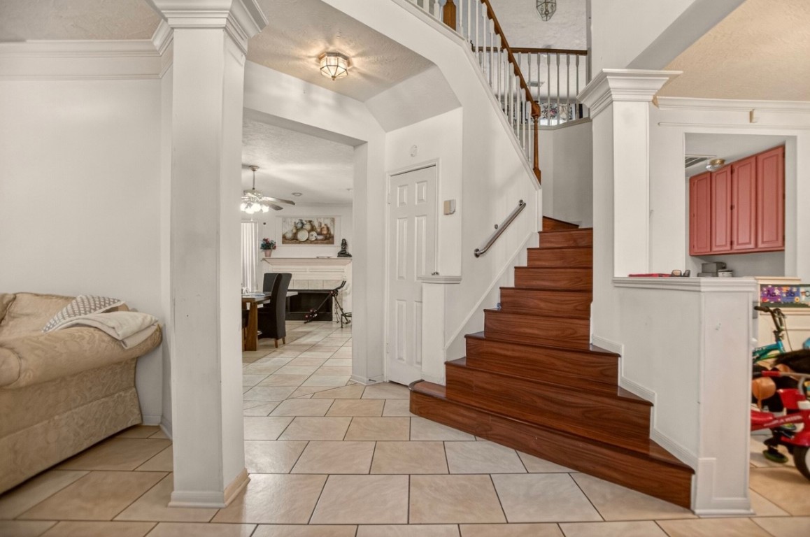 14731 Ridgechase Lane Houston, TX 77014 - Photo 4 of 29 a view of entryway and hall with a couch