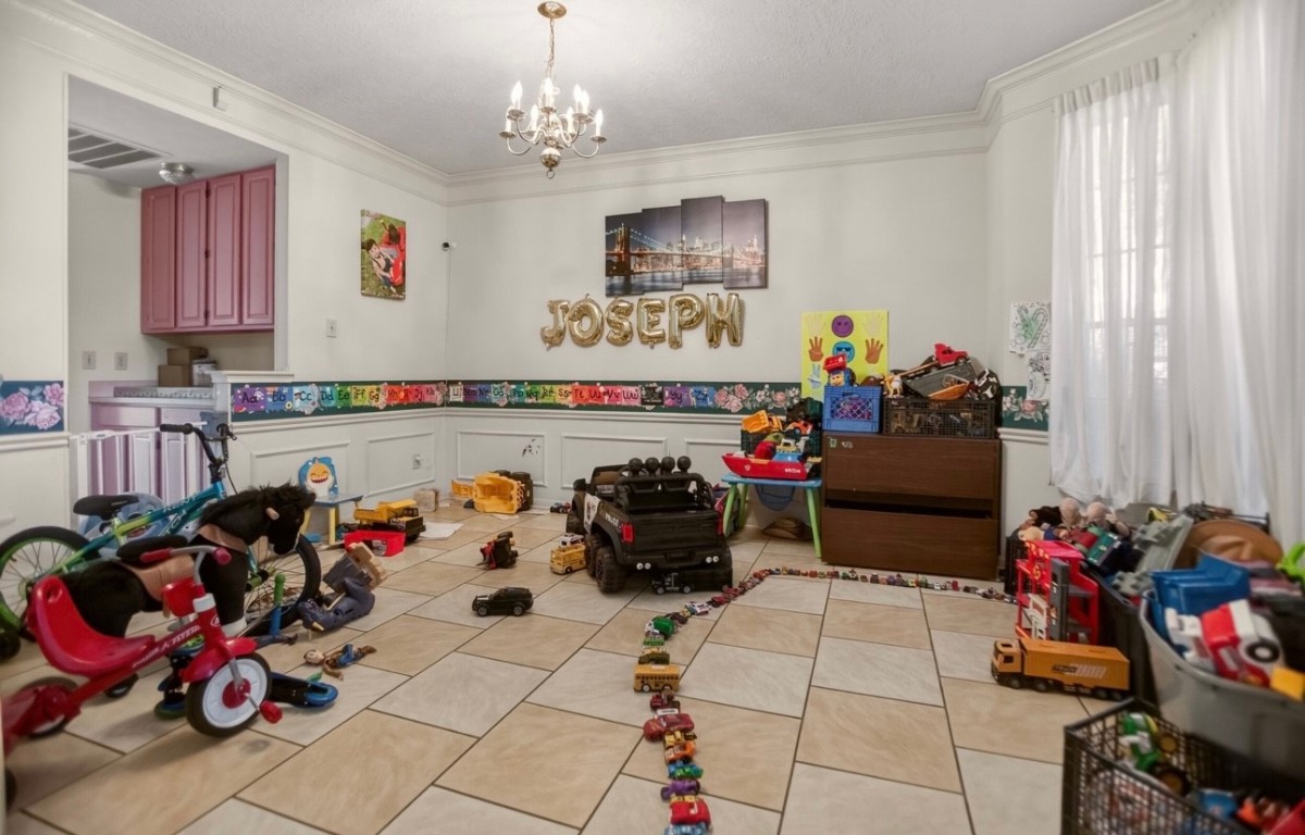 14731 Ridgechase Lane Houston, TX 77014 - Photo 6 of 29 a view of a room with lots of stuff and toys