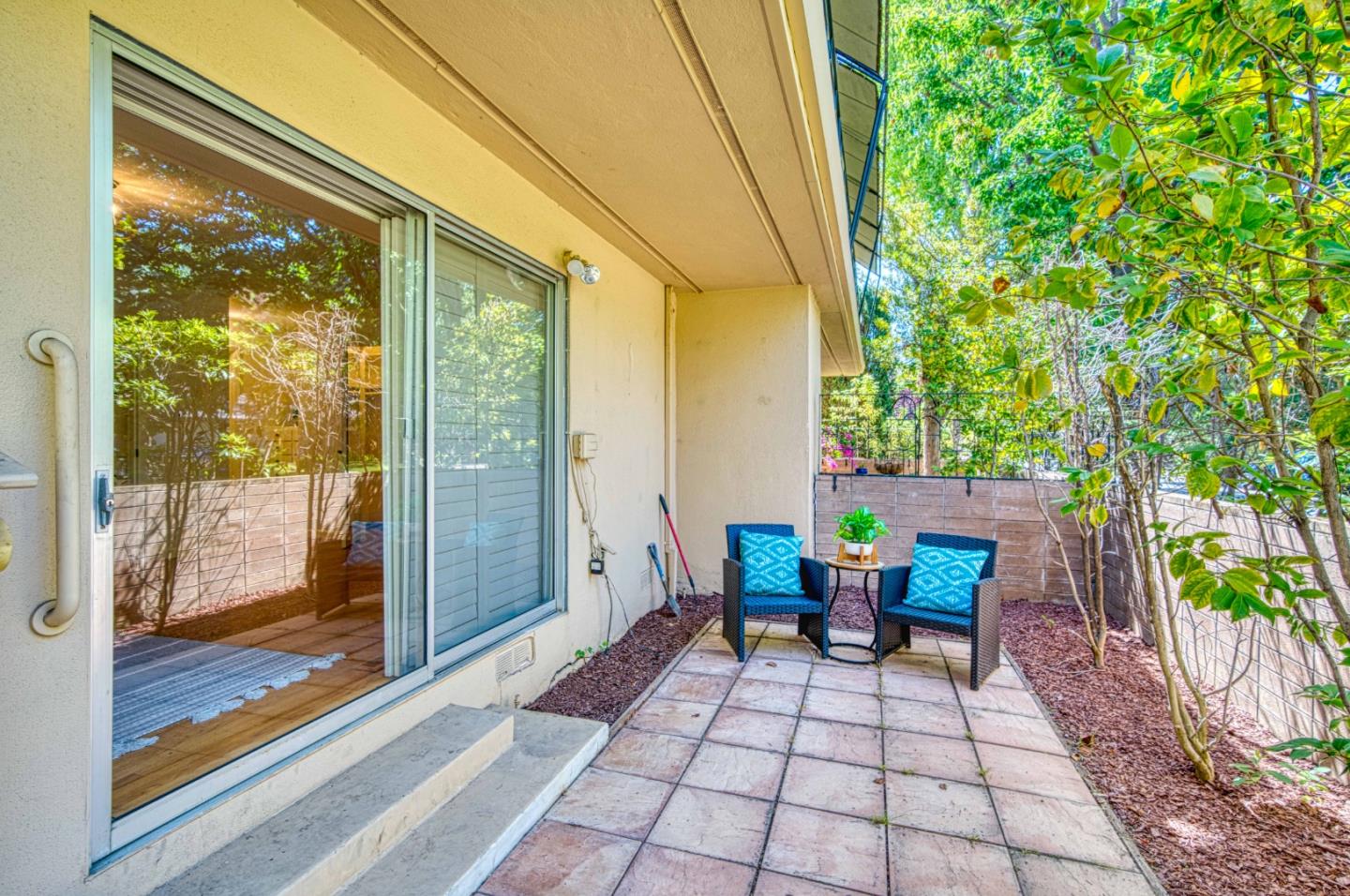 760 University Avenue Palo Alto, CA 94301 - Photo 22 of 25 a view of a porch with chairs and backyard