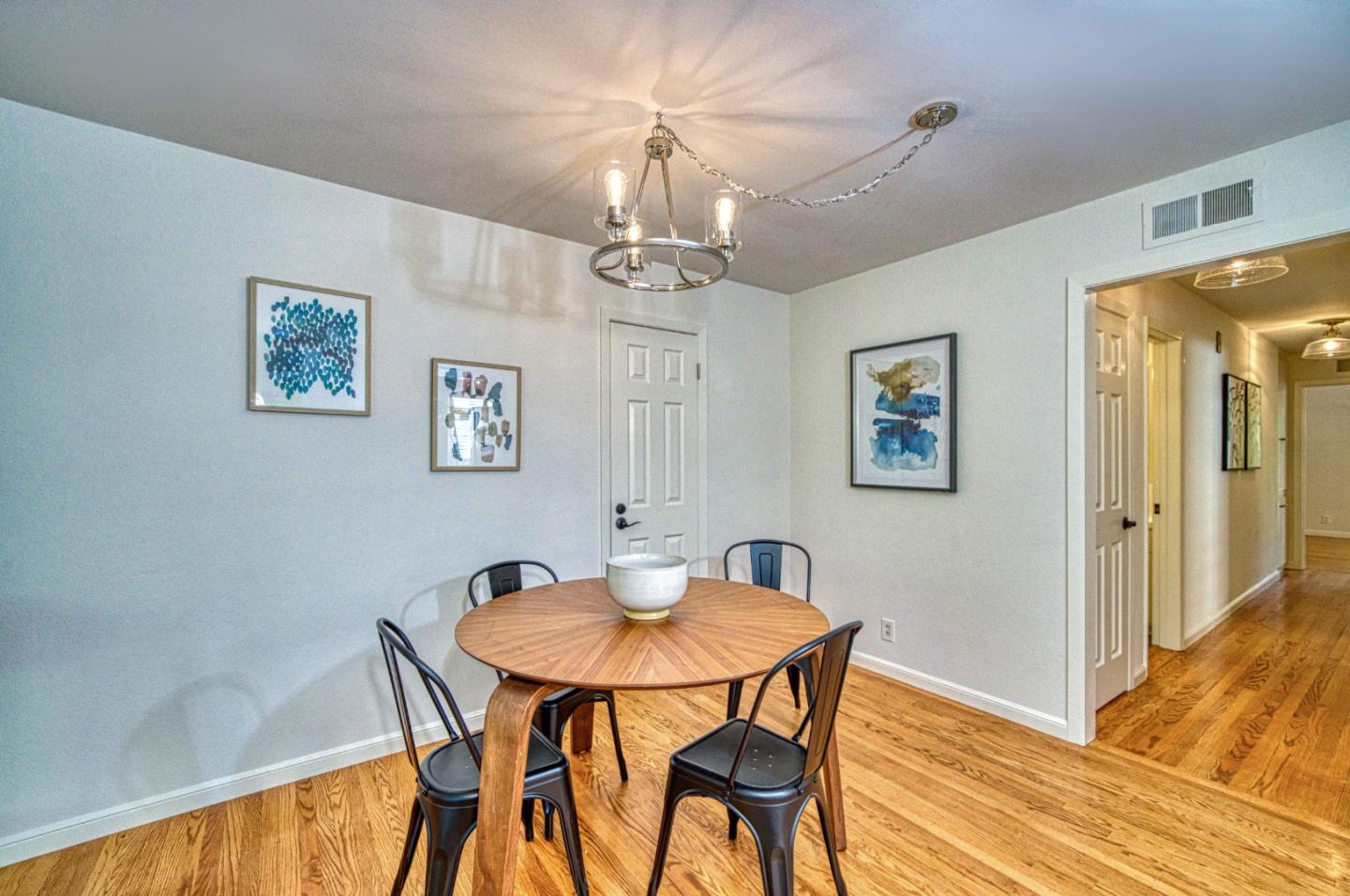 760 University Avenue Palo Alto, CA 94301 - Photo 7 of 25 a view of a dining room with furniture and a chandelier