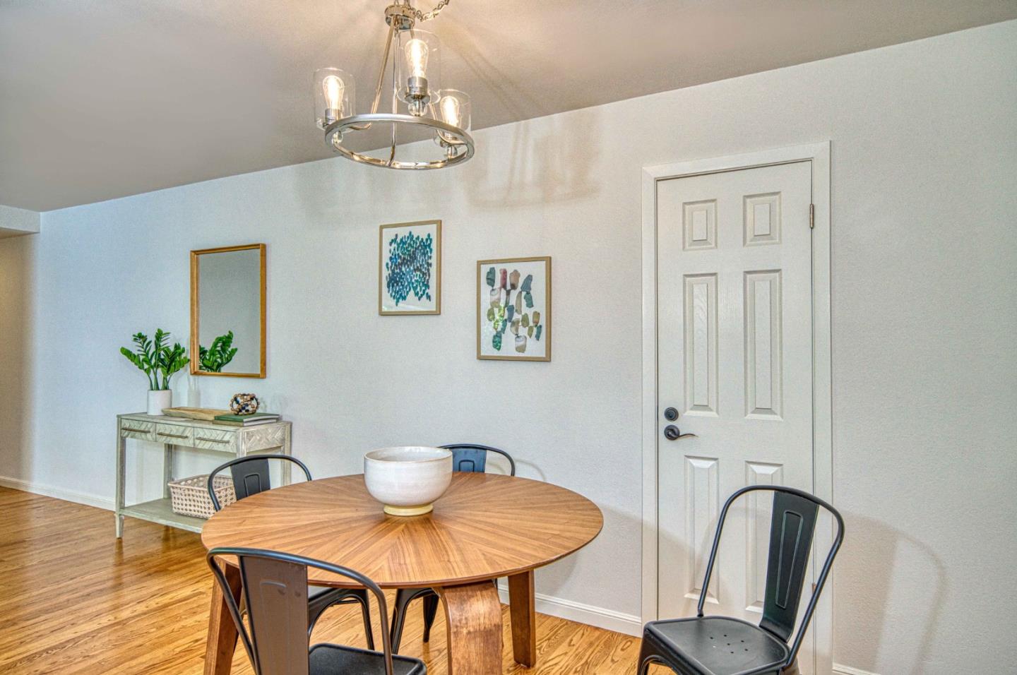 760 University Avenue Palo Alto, CA 94301 - Photo 9 of 25 a view of a dining room with furniture and chandelier