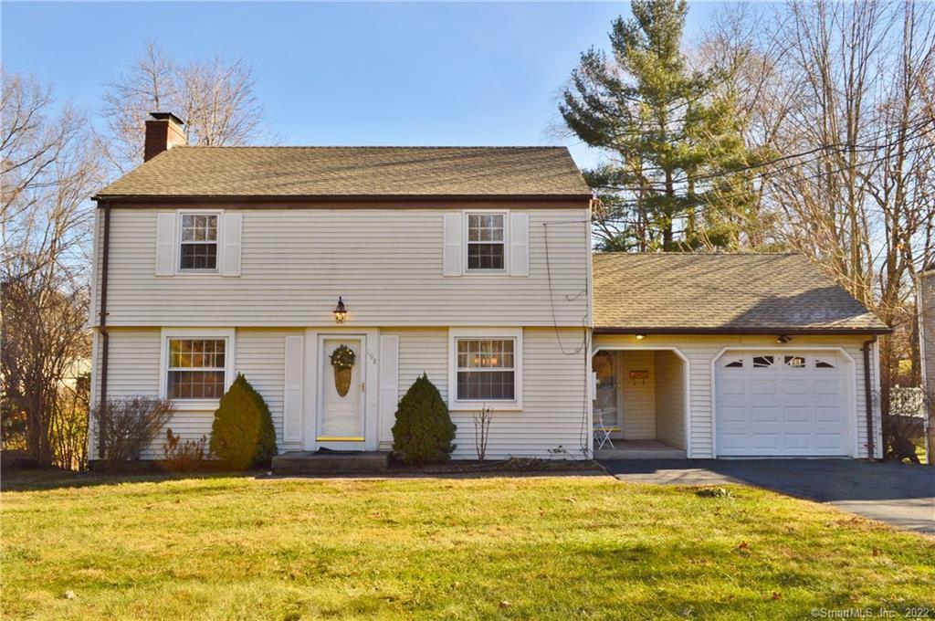 198 Mountain Road West Hartford, CT 06107 - Photo 1 of 1 a view of a house with yard and garage