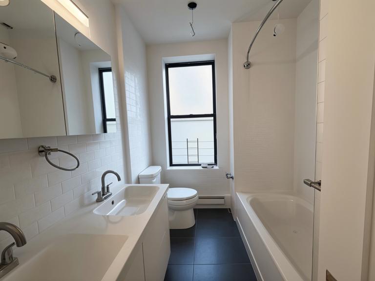 290 Riverside Drive, Unit 1B Manhattan, NY 10025 - Photo 5 of 7 a bathroom with a sink a toilet and shower