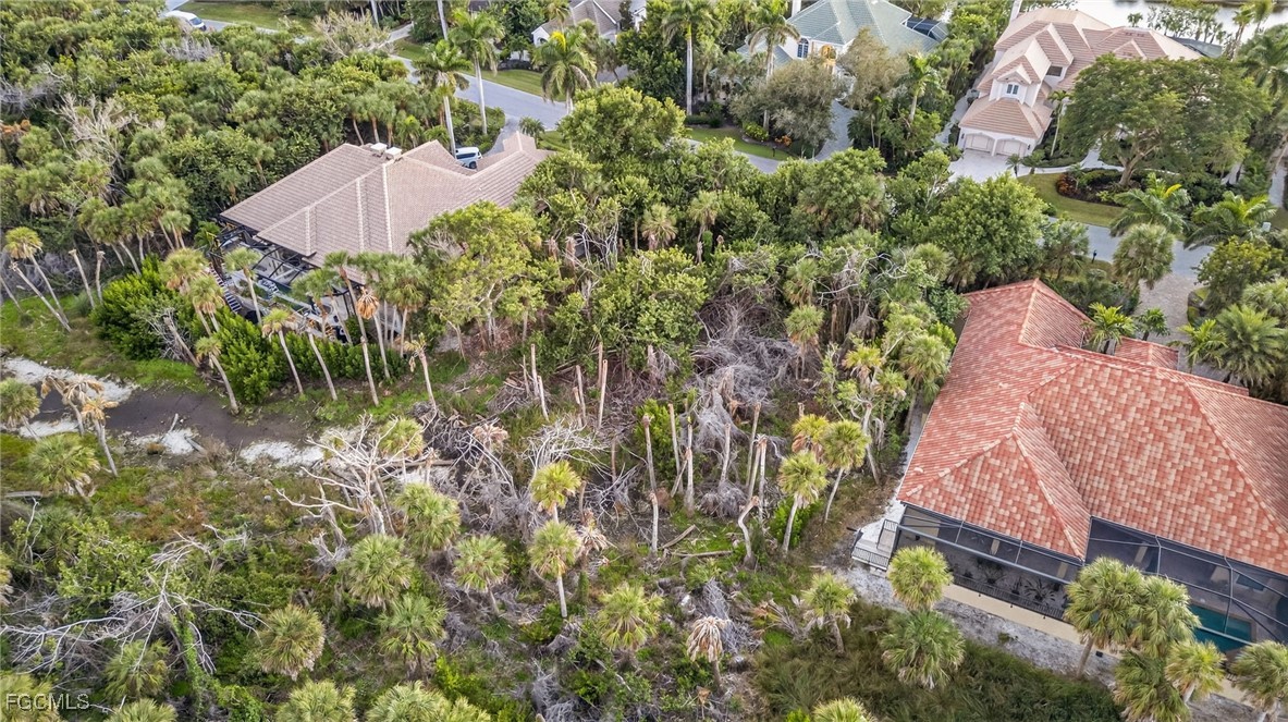 2372 Wulfert Road Sanibel, FL 33957 - Photo 4 of 12 an aerial view of house with yard