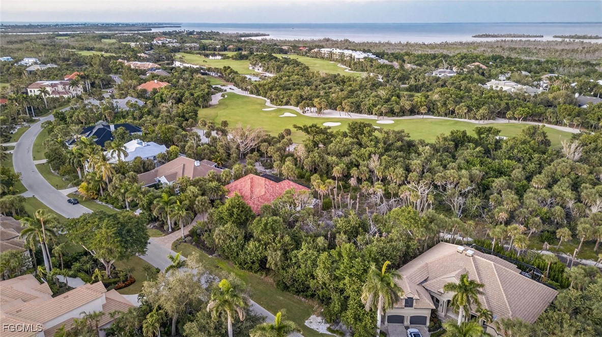 2372 Wulfert Road Sanibel, FL 33957 - Photo 7 of 12 an aerial view of a house with a lake view