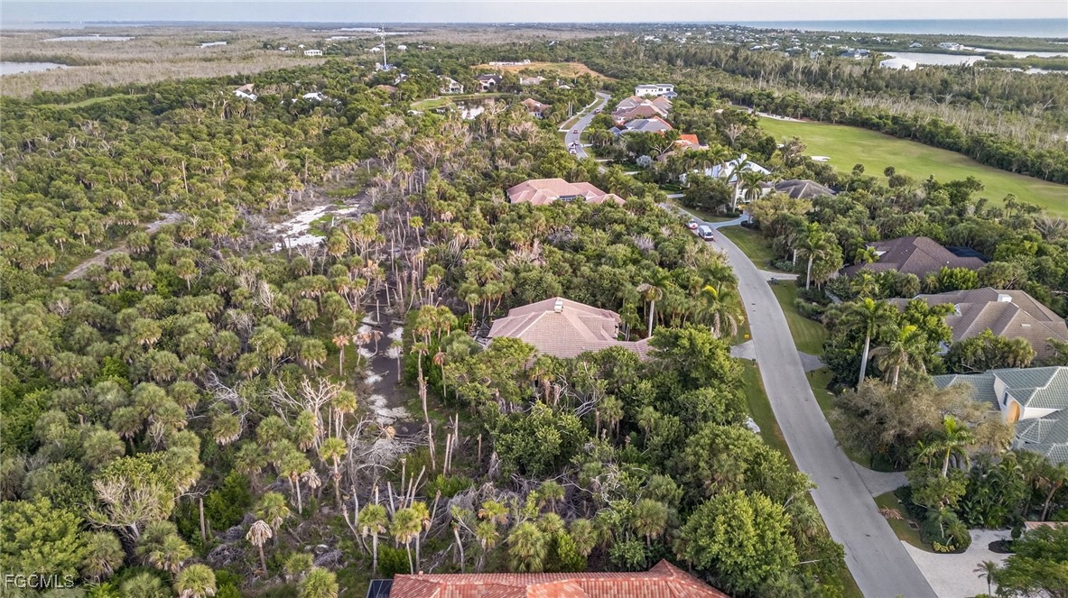 2372 Wulfert Road Sanibel, FL 33957 - Photo 9 of 12 an aerial view of city and lake