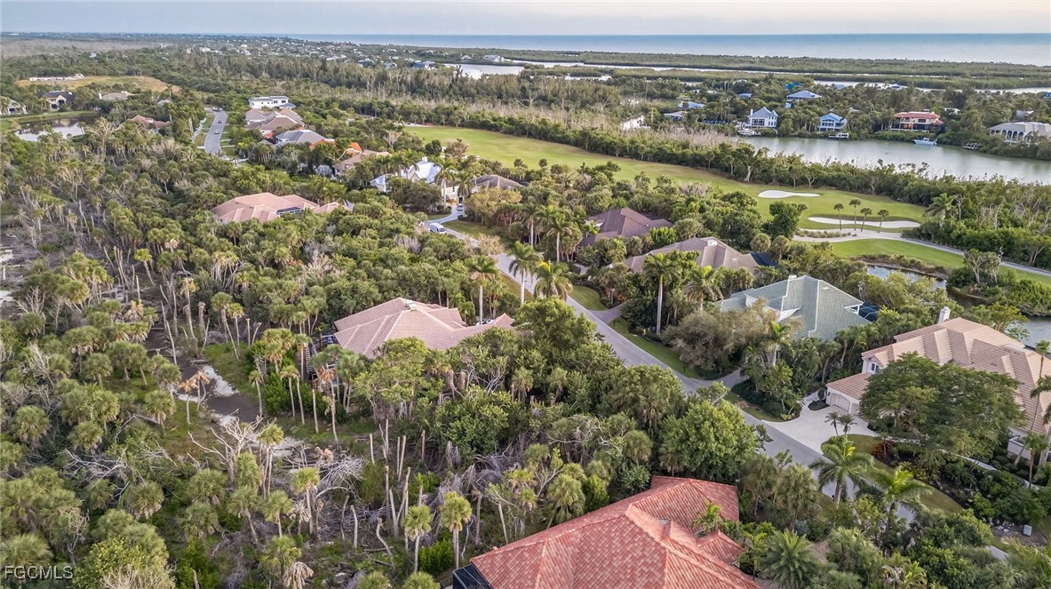 2372 Wulfert Road Sanibel, FL 33957 - Photo 10 of 12 an aerial view of residential houses with outdoor space