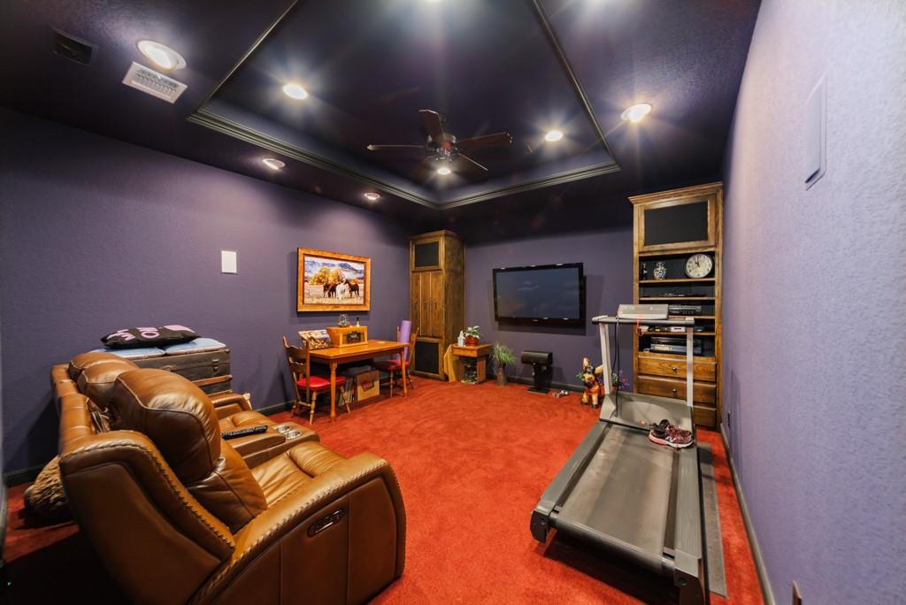 433 Fruitland Road Bowie, TX 76230 - Photo 13 of 40 a living room with furniture and a flat screen tv