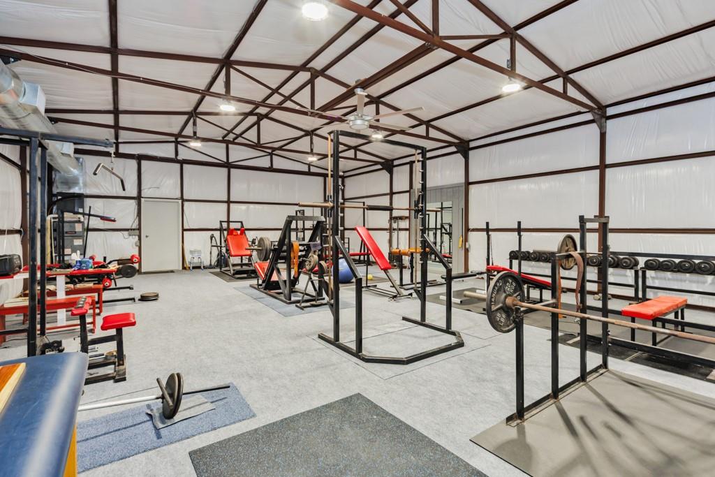 433 Fruitland Road Bowie, TX 76230 - Photo 29 of 40 a view of a garage with storage