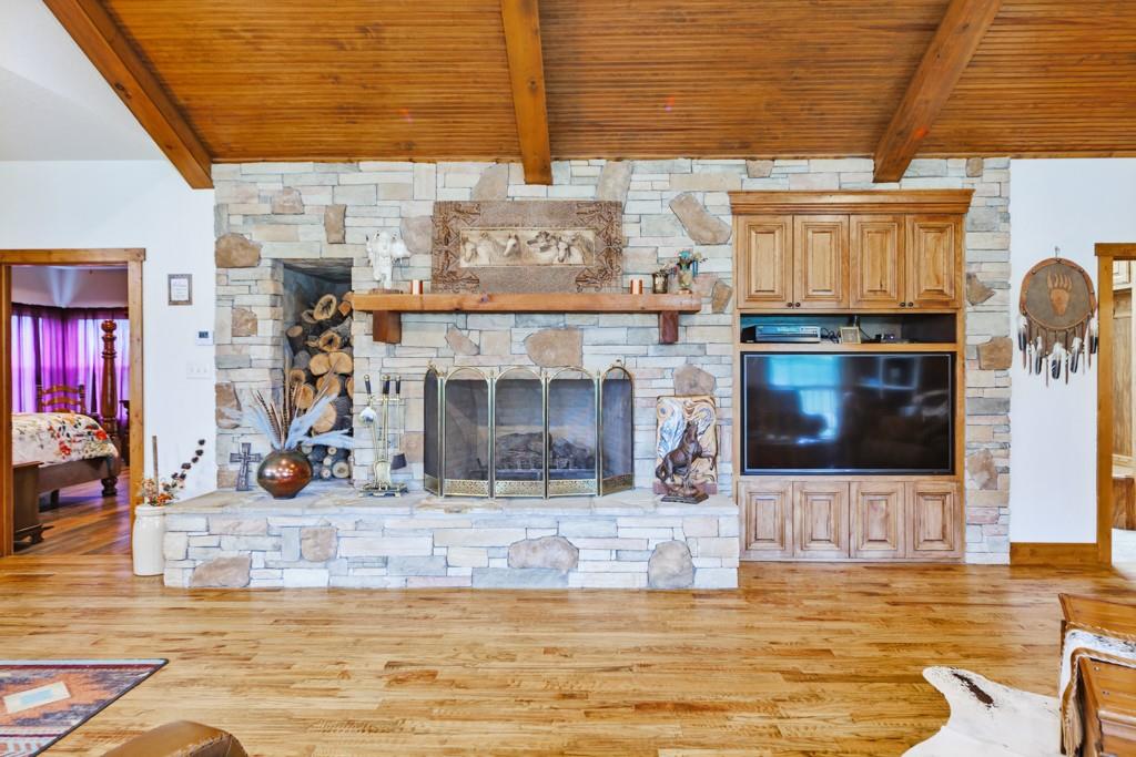 433 Fruitland Road Bowie, TX 76230 - Photo 6 of 40 a view of a fireplace and window
