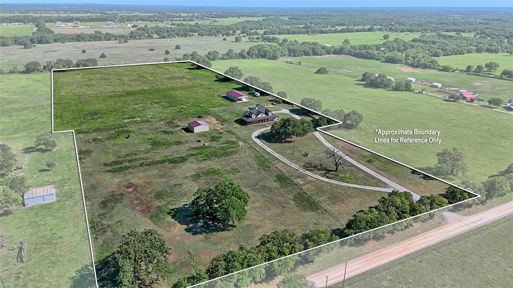 433 Fruitland Road Bowie, TX 76230 - Photo 7 of 40 an aerial view of a house