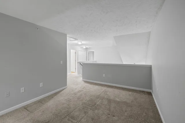 a bathroom with a sink and vanity