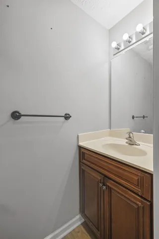 a bedroom with bed and flat screen tv