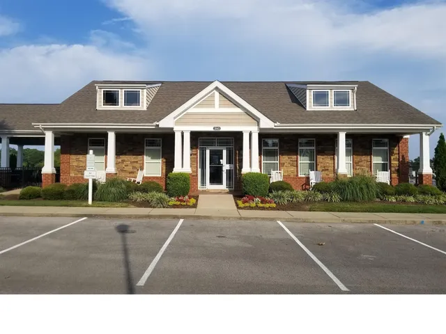 a view of a house with swimming pool