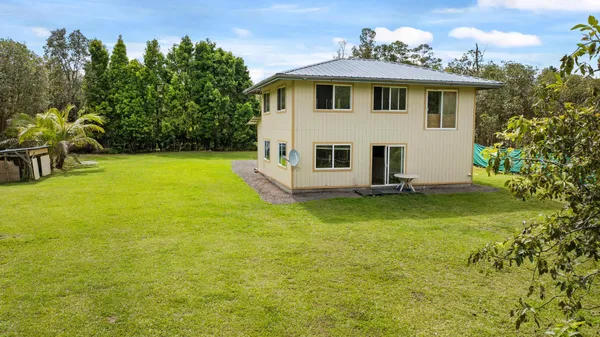 a view of a house with garden