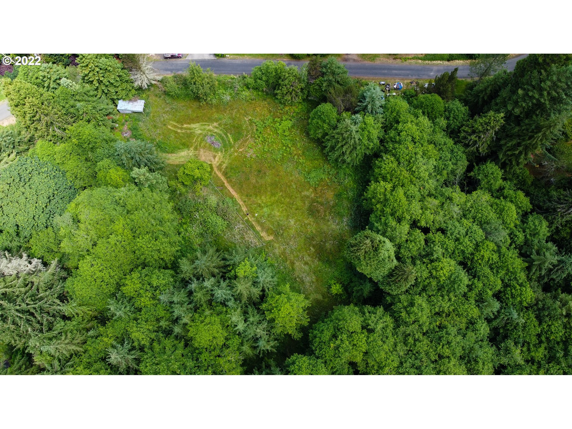 Sylvandale Astoria, OR 97103 - Photo 5 of 10 a open area with trees in the background