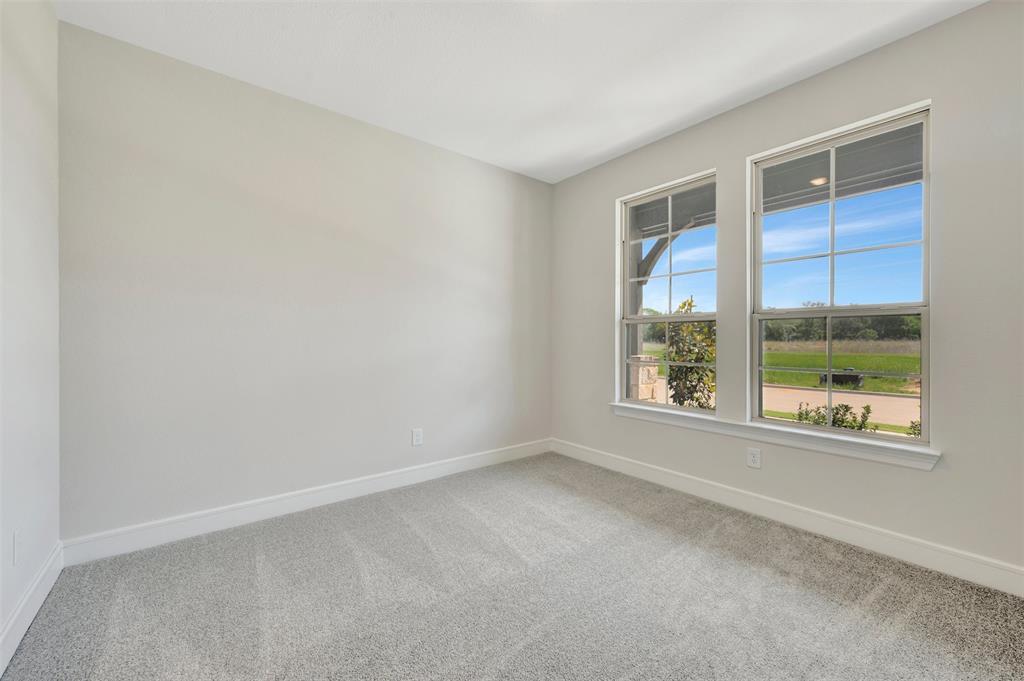 11460 Wulstone Road Fort Worth, TX 76052 - Photo 23 of 40 a view of an empty room with a window