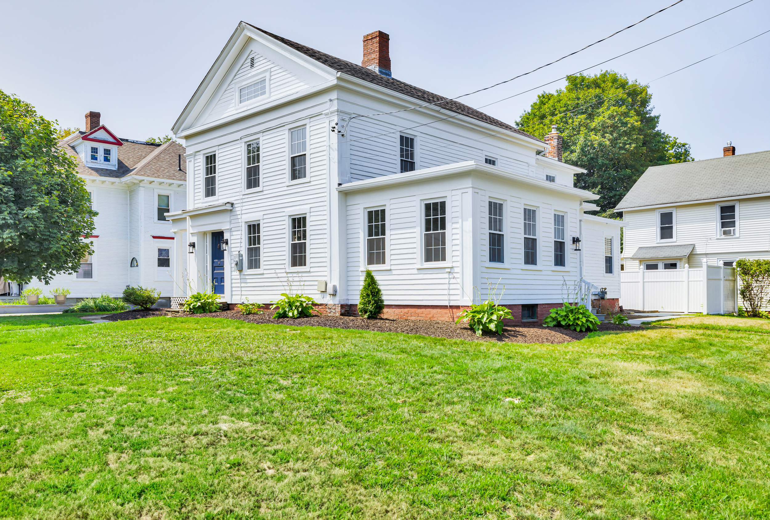 1070 Enfield Street Enfield, CT 06082 - Photo 2 of 35 a view of a house with a yard
