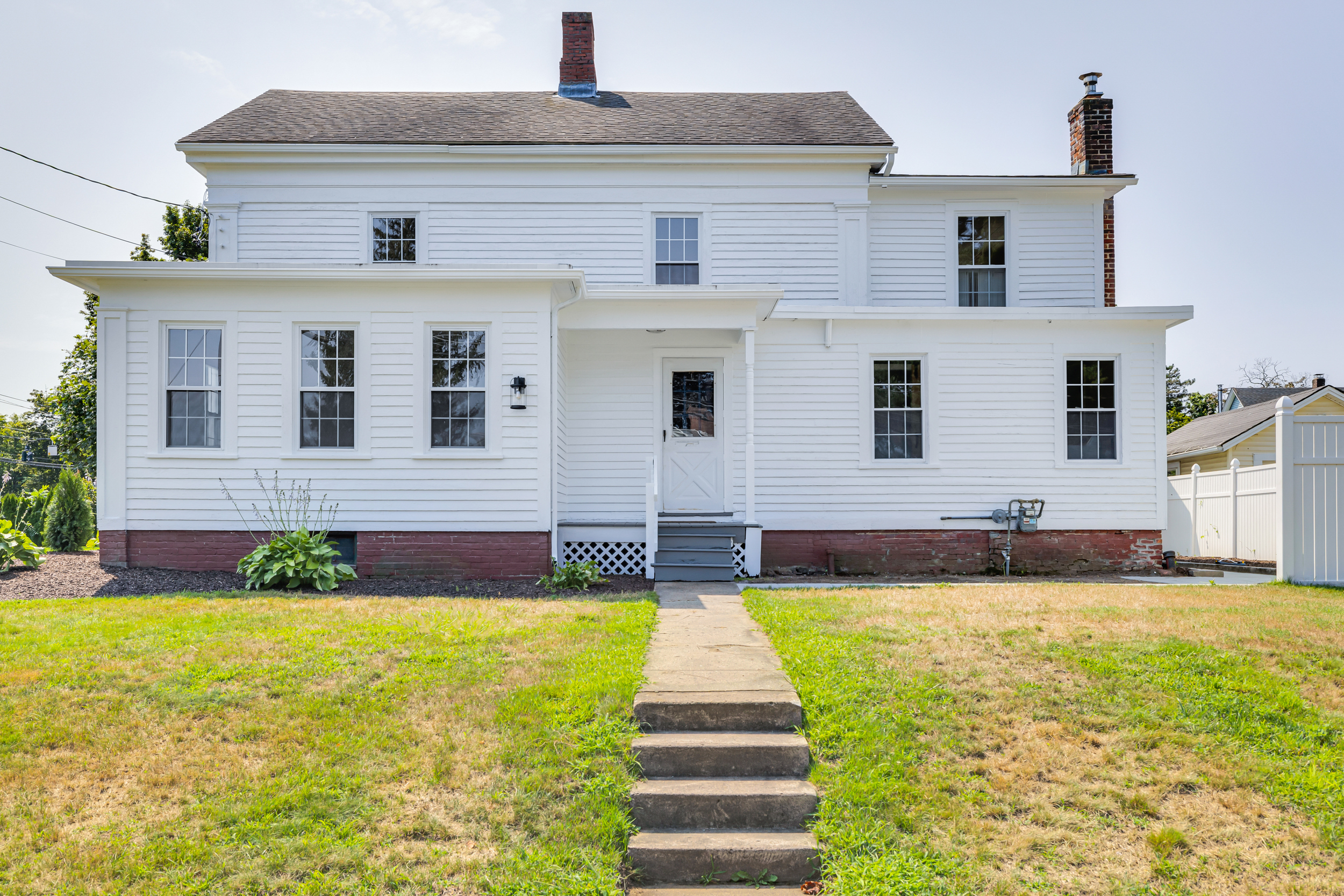 1070 Enfield Street Enfield, CT 06082 - Photo 31 of 35 a front view of a house with swimming pool