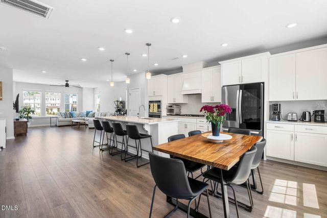 a view of swimming pool with a sitting area