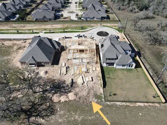 a view of swimming pool with a yard