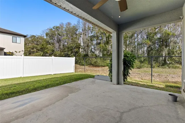 a view of backyard with green space