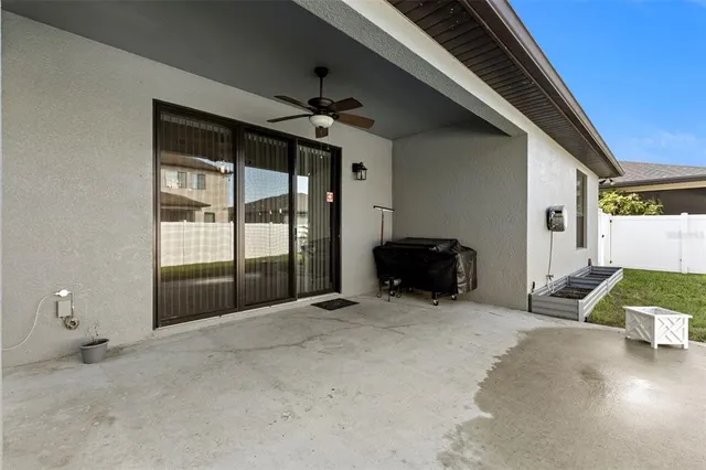 a big room with closet and a large window