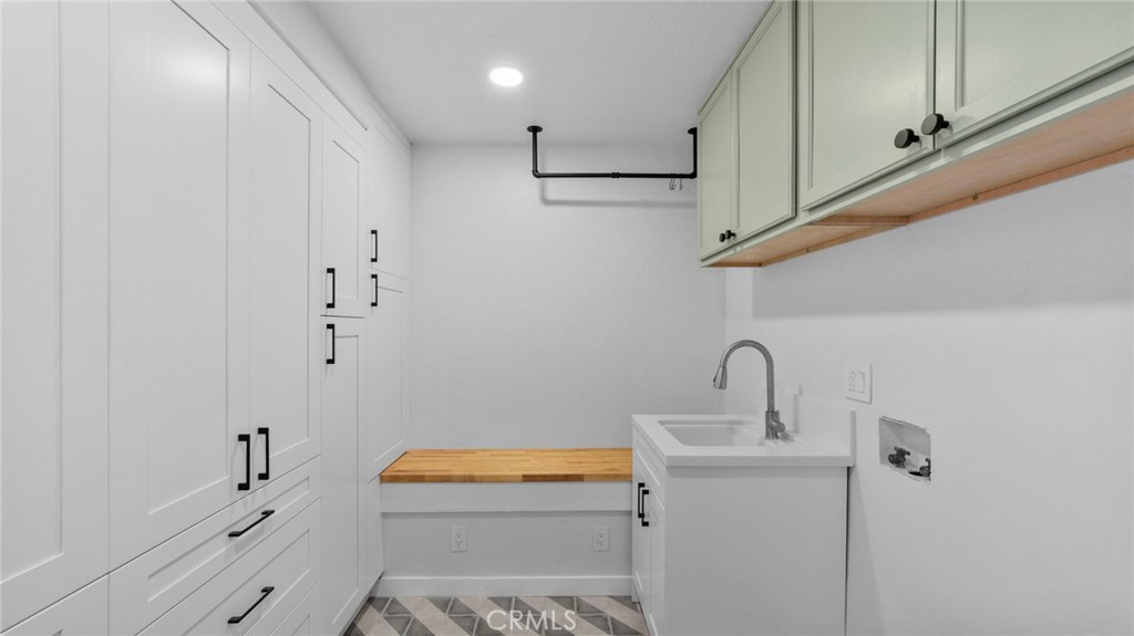 1726 Kings Road Vista, CA 92084 - Photo 47 of 66 Laundry Room w/utility sink