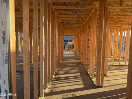a view of a entryway door with wooden floor