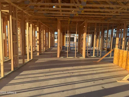 a view of stairs and three windows