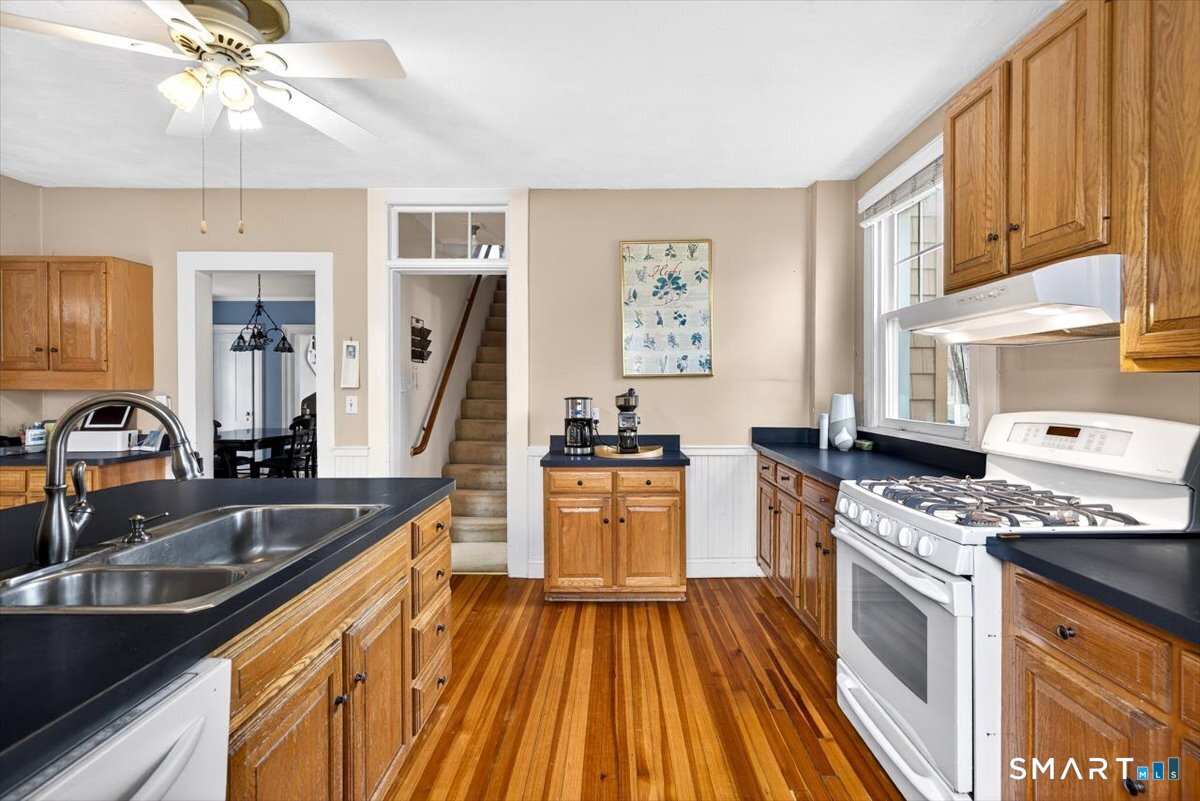 95 Clark Street New Haven, CT 06511 - Photo 13 of 39 a kitchen with stainless steel appliances granite countertop a sink stove and refrigerator