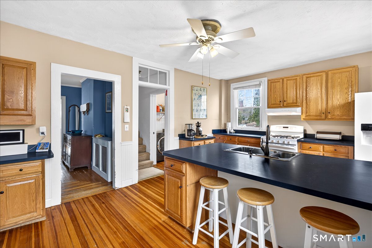 95 Clark Street New Haven, CT 06511 - Photo 15 of 39 a kitchen with stainless steel appliances granite countertop a sink stove and refrigerator