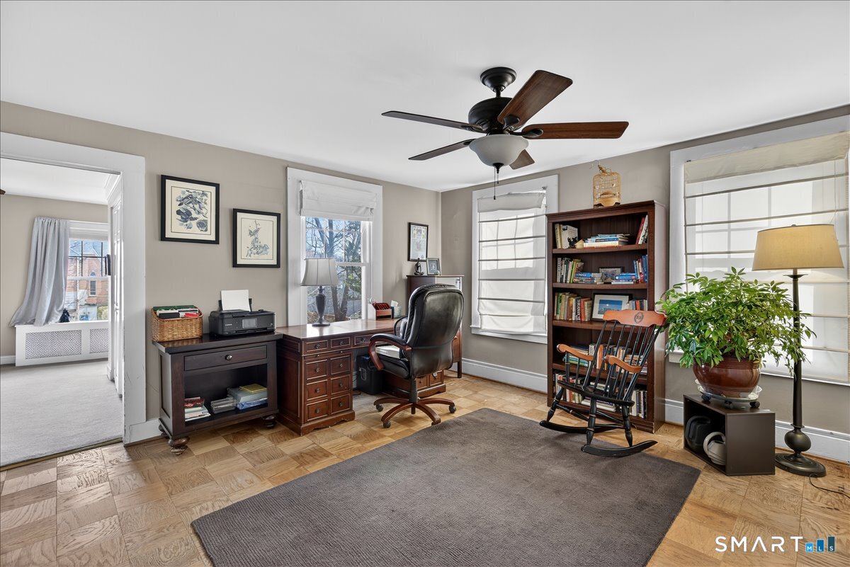 95 Clark Street New Haven, CT 06511 - Photo 18 of 39 a view of a workspace with furniture and a potted plant