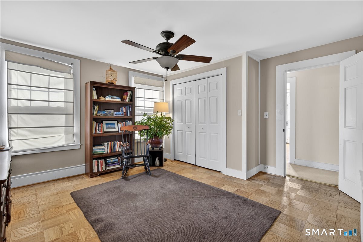95 Clark Street New Haven, CT 06511 - Photo 19 of 39 a view of a livingroom with a ceiling fan and window