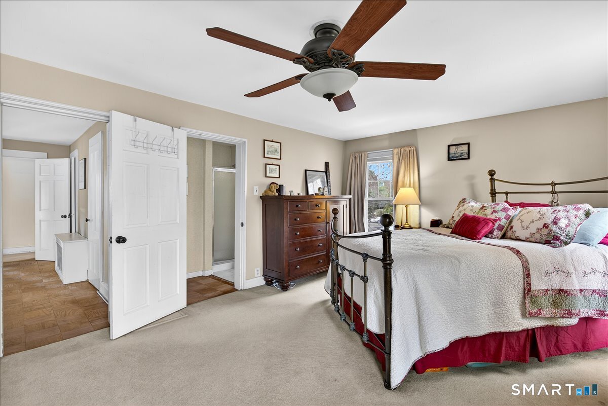 95 Clark Street New Haven, CT 06511 - Photo 21 of 39 a bedroom with bed and a chandelier