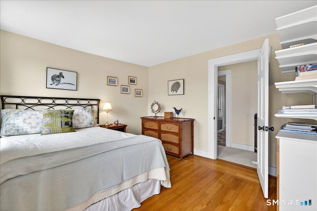 95 Clark Street New Haven, CT 06511 - Photo 25 of 39 a bedroom with a bed and a dresser in it