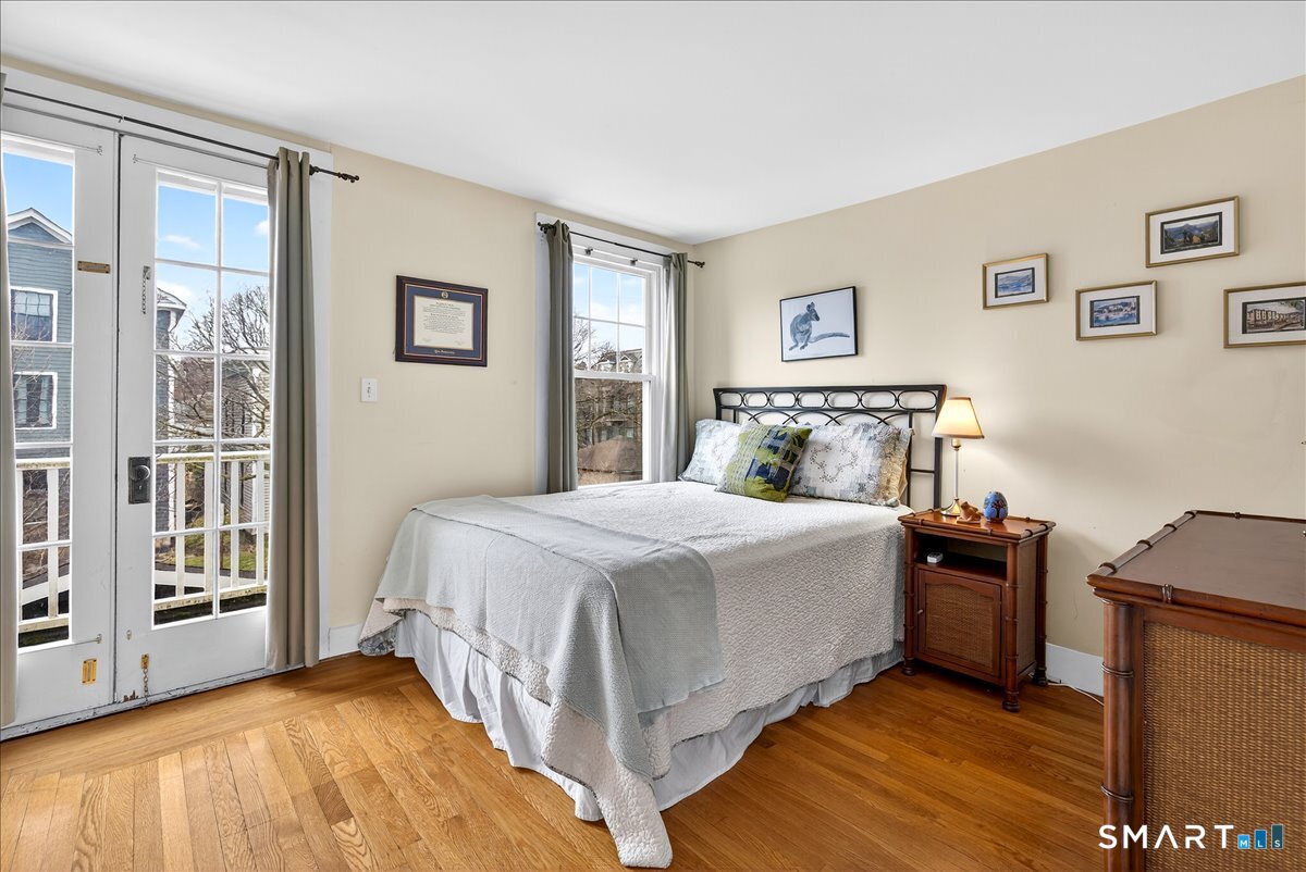 95 Clark Street New Haven, CT 06511 - Photo 27 of 39 a bedroom with a bed and a window
