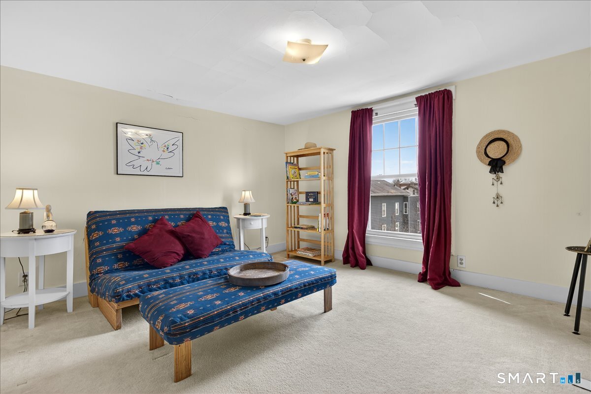95 Clark Street New Haven, CT 06511 - Photo 31 of 39 a living room with furniture and a window