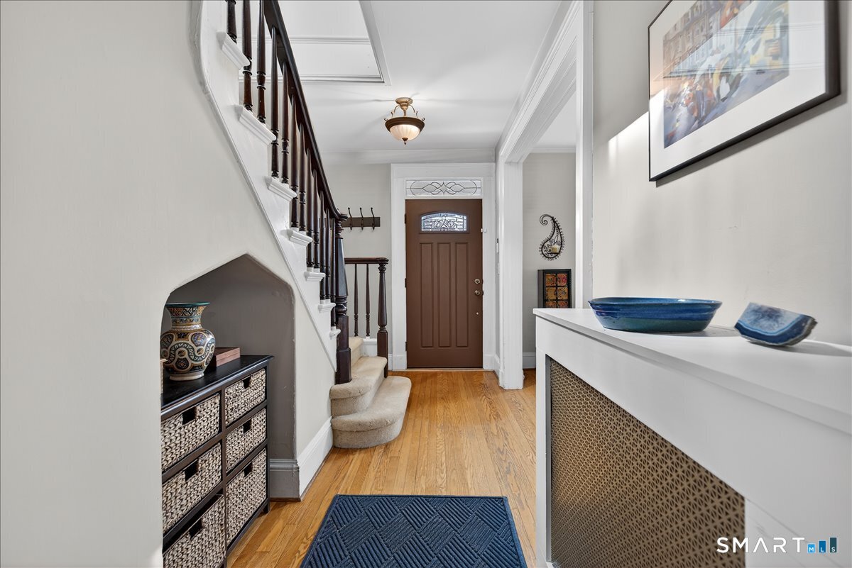 95 Clark Street New Haven, CT 06511 - Photo 4 of 39 a view of hallway with furniture and wooden floor