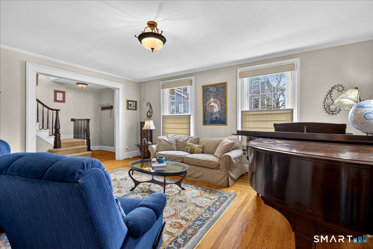 95 Clark Street New Haven, CT 06511 - Photo 6 of 39 a living room with furniture and a window