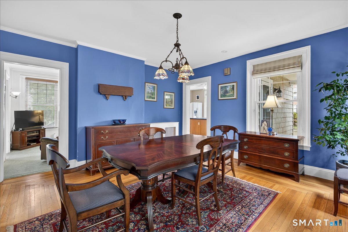 95 Clark Street New Haven, CT 06511 - Photo 7 of 39 a view of a dining room with furniture window and wooden floor