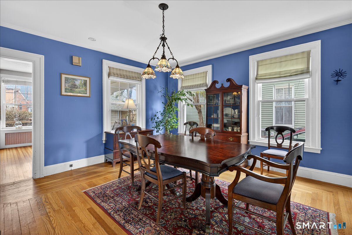 95 Clark Street New Haven, CT 06511 - Photo 9 of 39 a view of a dining room with furniture window and wooden floor