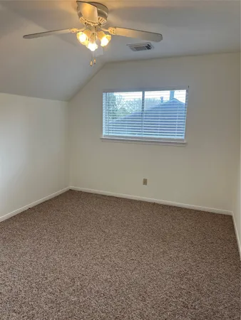en empty room with a window