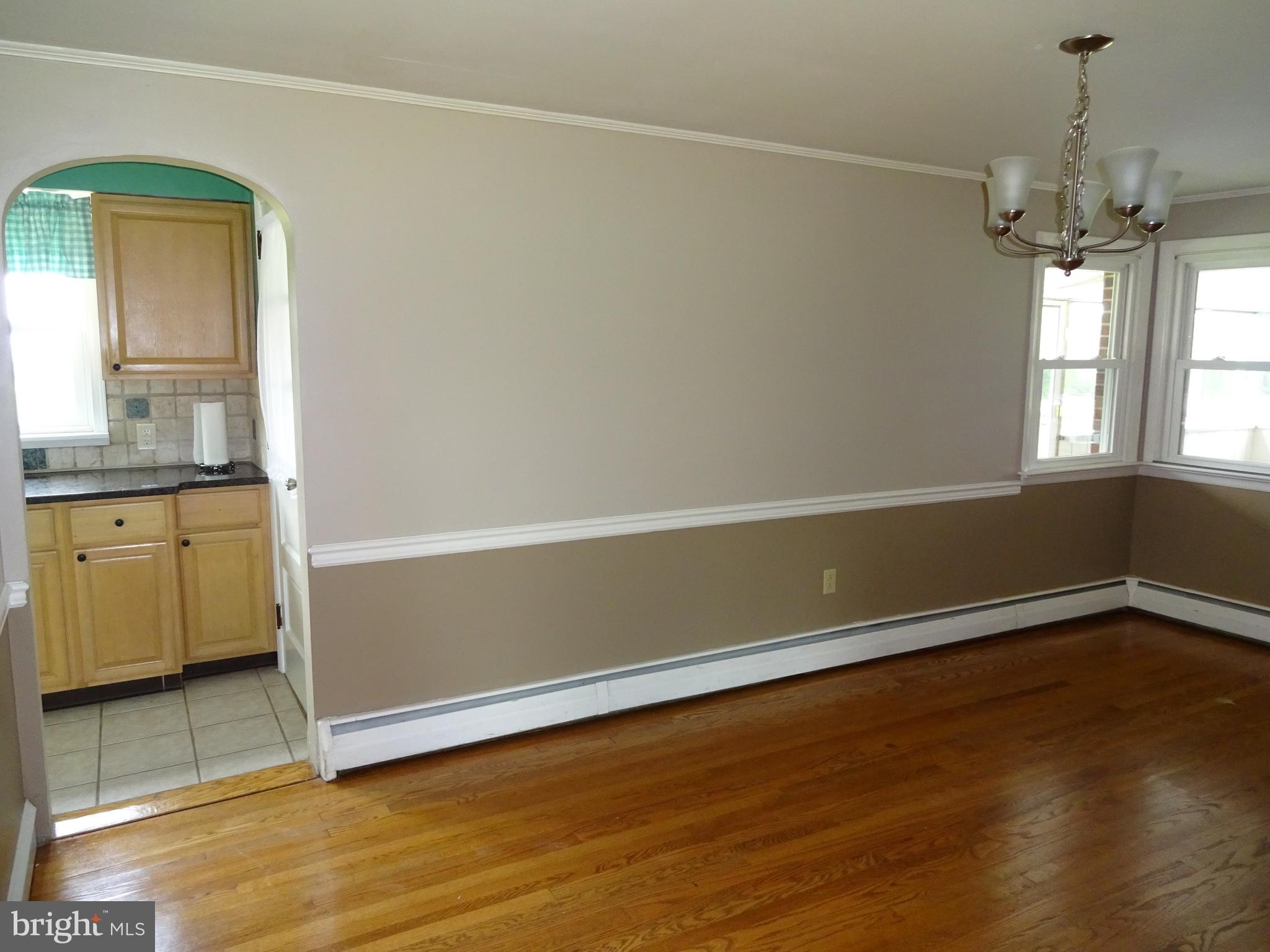 79 Bonnie Brae Road Spring City, PA 19475 - Photo 14 of 35 wooden floor in an empty room with a window