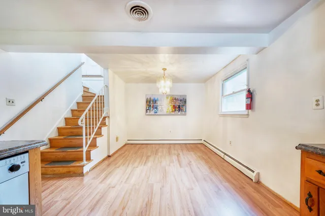 a view of wooden floor in an empty room